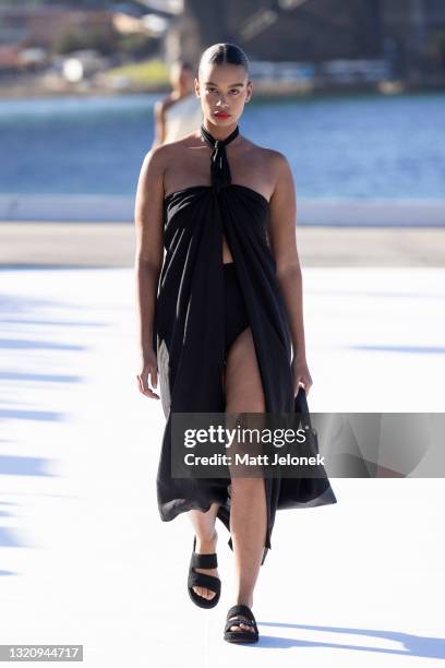 Model walks the runway during the BONDI BORN show during Afterpay Australian Fashion Week 2021 Resort '22 Collections at the Northern Wharf...