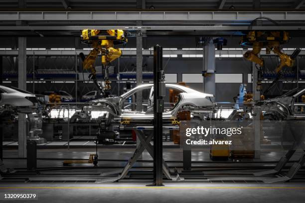 3d-rendering av en bil på robotsvetslinje - fabrik bildbanksfoton och bilder