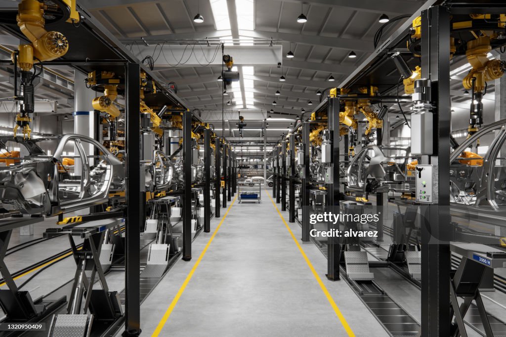 Het binnenland van een fabriek van de voertuigproductie in 3d geeft terug