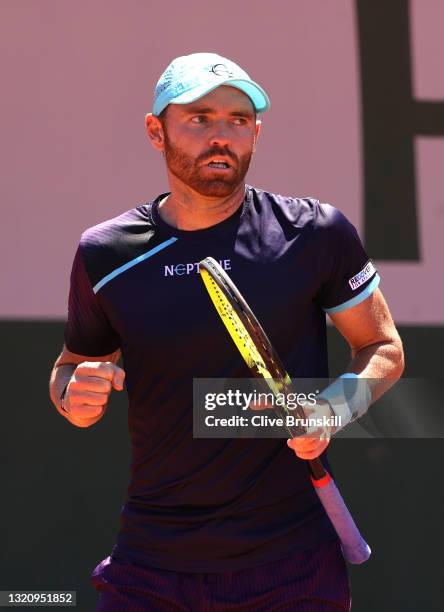 Bjorn Fratangelo of The United States reacts in their mens singles first round match against Cameron Norrie of Great Britain on day two of the 2021...