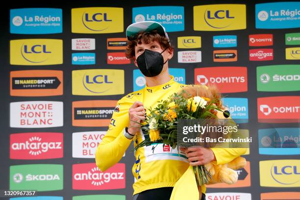 Lukas Pöstlberger of Austria and Team Bora - Hansgrohe yellow leader jersey celebrates at podium during the 73rd Critérium du Dauphiné 2021, Stage 2...