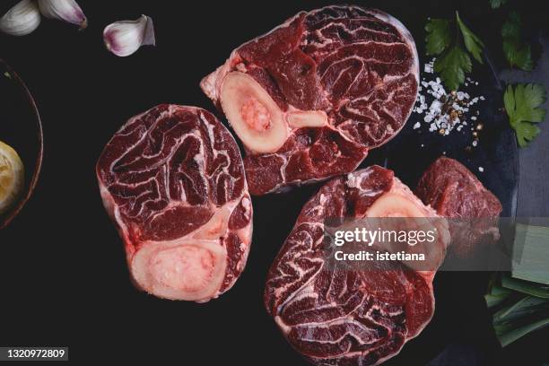 raw osso buco,  fresh veal cut meat, italian cuisine background with ingredients - beef stock pictures, royalty-free photos & images