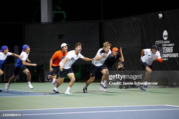 The Florida Gators celebrate their victory against the Baylor Bears during the Division I Men"u2019s Tennis Championship held at the USTA National...