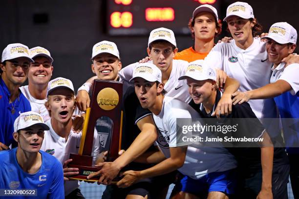 The Florida Gators celebrate after defeating the Baylor Bears during the Division I Men"u2019s Tennis Championship held at the USTA National Campus...