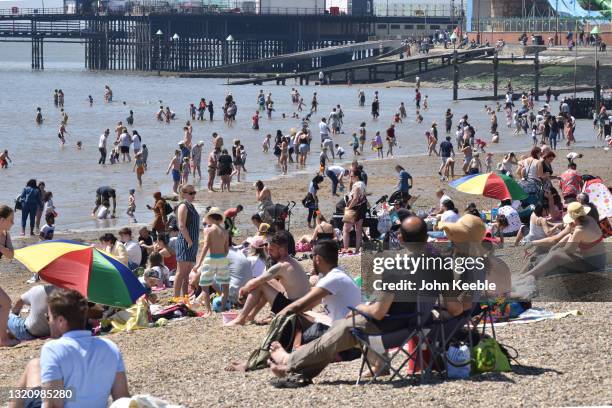 Crowds gather to enjoy the warm sunny weather on Jubilee beach on May 31, 2021 in Southend, England. Today's bank holiday Monday brings highs of 77F...