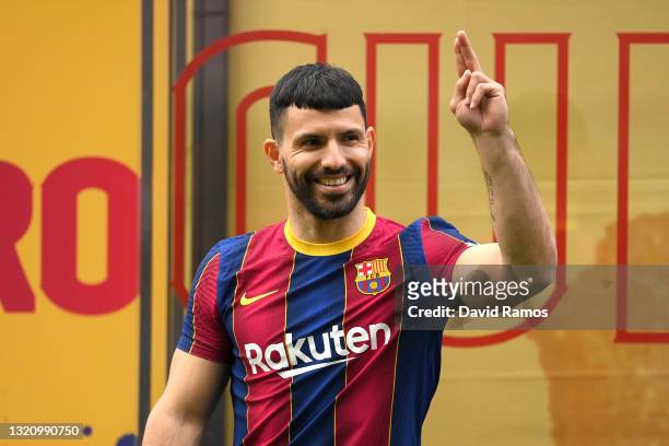 Sergio Aguero reacts as he is presented as a Barcelona player at the Camp Nou Stadium on May 31, 2021 in Barcelona, Spain.