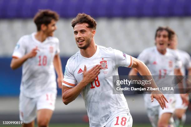 Javier Puado of Spain celebrates after scoring their side's first goal during the 2021 UEFA European Under-21 Championship Quarter-finals match...