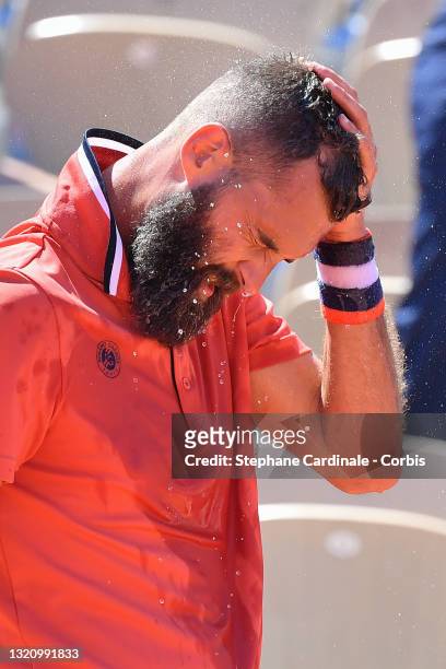 Benoit Paire of France reacts in their mens singles first round match against Casper Ruud of Norway on day two of the 2021 French Open at Roland...