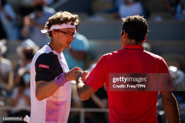 Roger Federer of Switzerland hits a forehand against Dennis Istomin of Uzbekistan in the first round of the men’s singles at Roland Garros on May 31,...