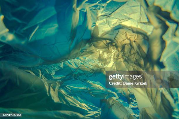 plastic bag - plastikmaterial stock-fotos und bilder