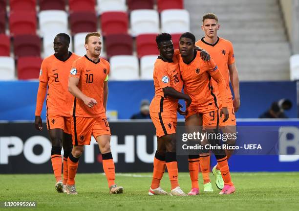 Myron Boadu of Netherlands celebrates with team mates after scoring their side's second goal during the 2021 UEFA European Under-21 Championship...