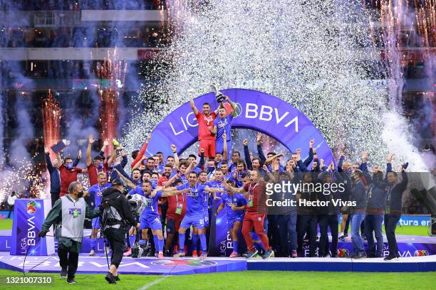 Players of Cruz Azul celebrate with the trophy after winning during the Final second leg match between Cruz Azul and Santos Laguna as part of the...