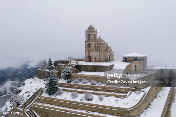 senhora da graca church drone view with snow mondim de basto, portugal - graca church stock pictures, royalty-free photos & images