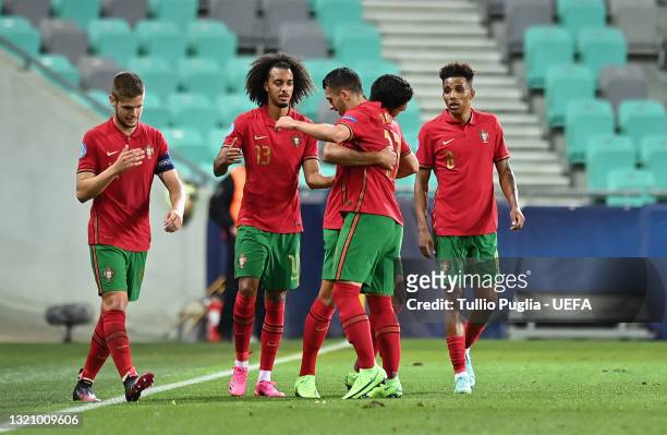 Dany Mota of Portugal celebrates with Tomas Tavares after scoring their side's second goal during the 2021 UEFA European Under-21 Championship...