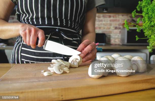 cutting mushrooms - green mushroom stock pictures, royalty-free photos & images