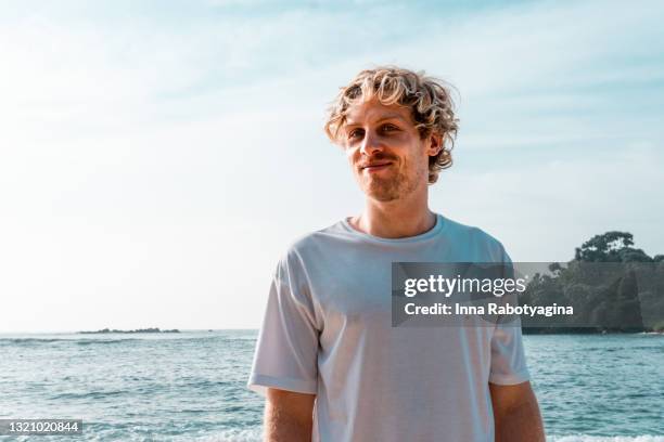 young man portrait on vacation on the beach in sri lanka island - handsome man imagens e fotografias de stock