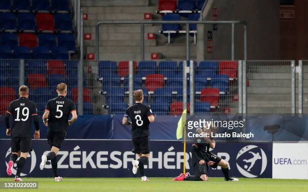 Jonathan Burkardt of Germany celebrates with Paul Jaeckel after scoring their side's second goal during the 2021 UEFA European Under-21 Championship...