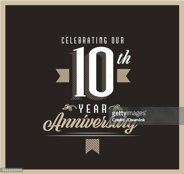 retro and vintage 10 year anniversary label design on black background - anniversary stock illustrations