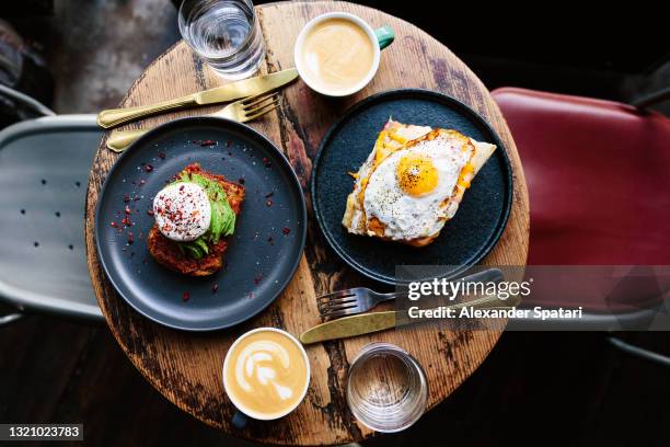 breakfast at the cafe, high angle view - foodstyling stock-fotos und bilder