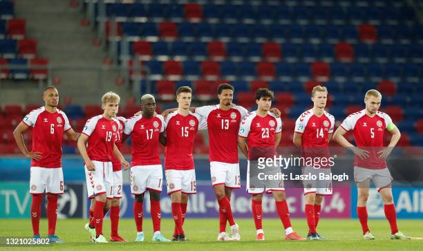 Players of Denmark look dejected during the penalty shoot out during the 2021 UEFA European Under-21 Championship Quarter-finals match between...