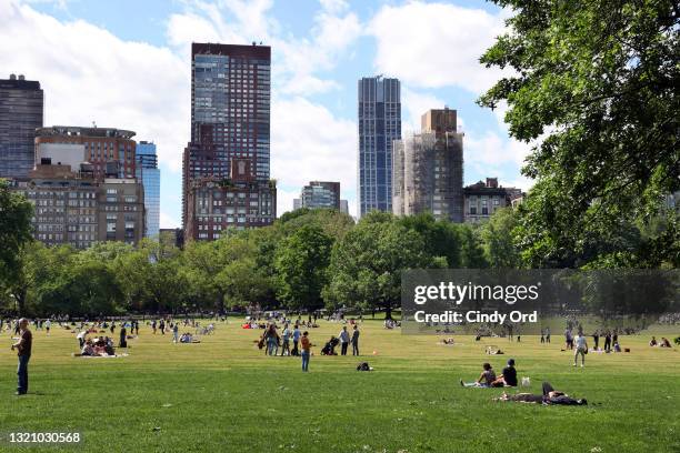 People fill Sheep Meadow in Central Park on May 31, 2021 in New York City. On May 19, coronavirus pandemic restrictions were lifted making Memorial...