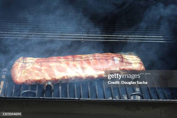 baby back ribs on the grill - bbq smoker stock pictures, royalty-free photos & images