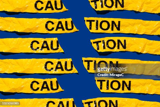 broken caution cordon stripes - social exclusion stock pictures, royalty-free photos & images