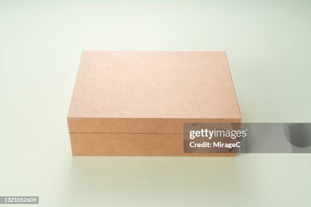 closed plain cardboard gift box - box front view stock pictures, royalty-free photos & images