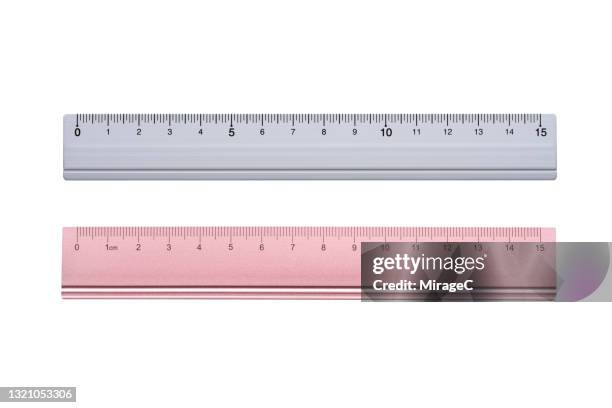 aluminum rulers isolated on white - ruler foto e immagini stock