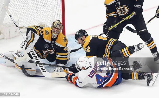 Tuukka Rask of the Boston Bruins makes the first period save against Leo Komarov of the New York Islanders in Game Two of the Second Round of the...