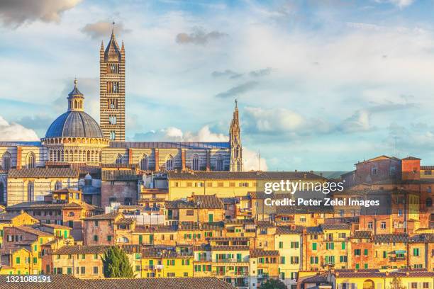 siena cityscape with the cathedral - duomo di siena stock pictures, royalty-free photos & images