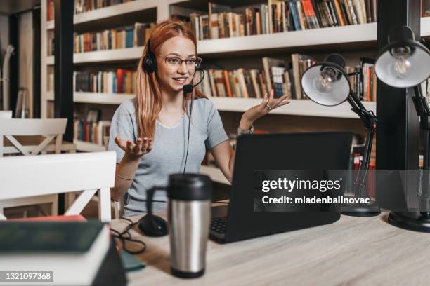 young college student studying at library - reading glasses isolated stock pictures, royalty-free photos & images