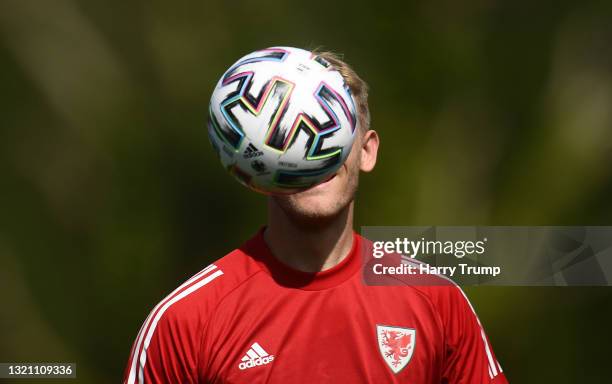 Adam Davies of Wales warms up during a Wales Training Session at The Vale Resort on June 01, 2021 in Vale of Glamorgan, Wales.