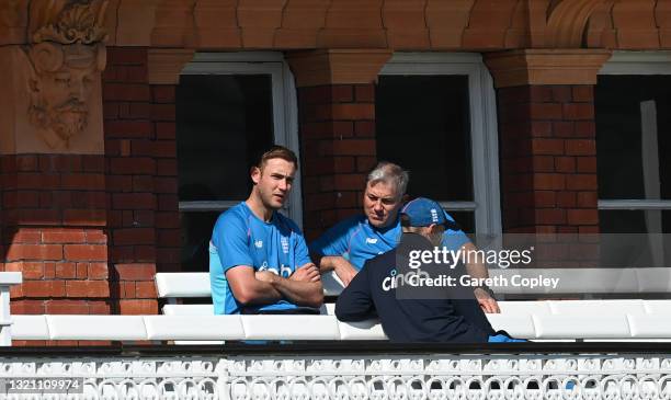 Stuart Broad of England speaks to coach Chris Silverwood and captain Joe Root a nets session at Lord's Cricket Ground on June 01, 2021 in London,...