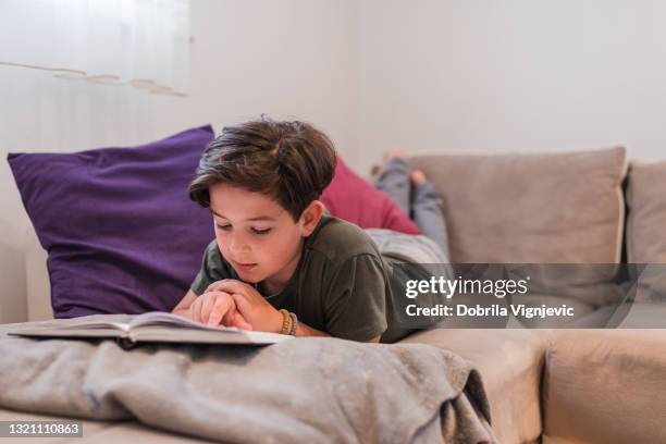Boy Writing A Story Photos and Premium High Res Pictures - Getty Images