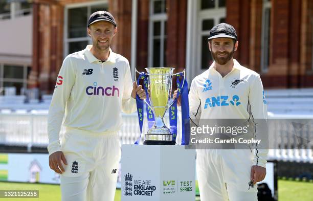 England captain Joe Root and New Zealand captain Kane Williamson pose with series trophy at Lord's Cricket Ground on June 01, 2021 in London, England.