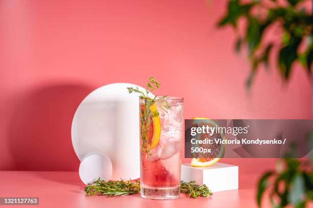 close-up of drinks on table against wall - ponche fotografías e imágenes de stock