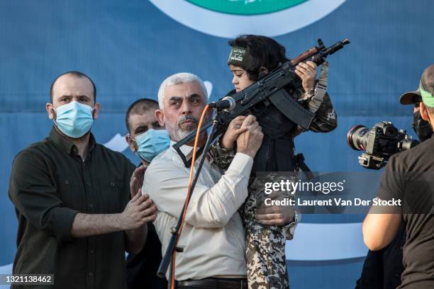 Yahya Sinwar, the elected leader of Hamas appears during a ceremony for fighters killed by Israeli air strikes at Yarmouk football Stadium on May...