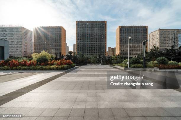 empty square by modern architectures - liaoning province stock pictures, royalty-free photos & images