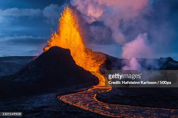 scenic view of lava against sky,grindavik,iceland - volcanic landscape stock pictures, royalty-free photos & images