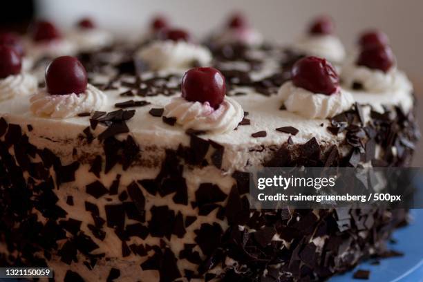 close-up of cake on table - black forest gateau stock-fotos und bilder