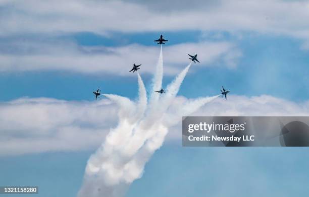The US Air Force Thunderbirds take to the sky during the Bethpage Air Show at Jones Beach in Wantagh, New York on May 31, 2021.
