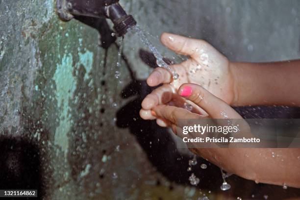 girl washing hands - washing hands close up stock pictures, royalty-free photos & images