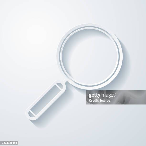 magnifying glass. icon with paper cut effect on blank background - papercutting stock illustrations