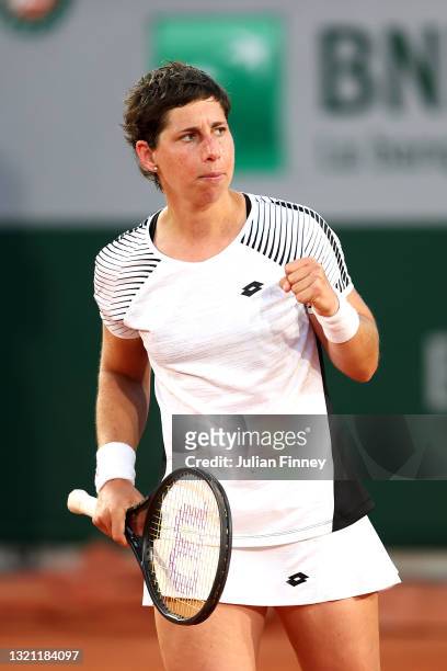 Carla Suarez Navarro of Spain celebrates in their ladies first round match against Sloane Stephens of The United States during day three of the 2021...