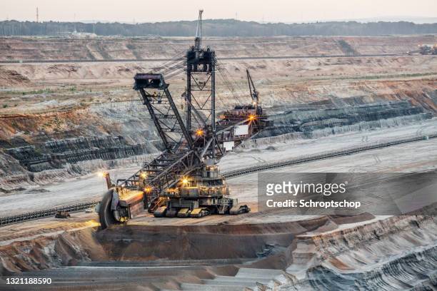 coal mining machinery at open-pit mine - open pit mine stock pictures, royalty-free photos & images