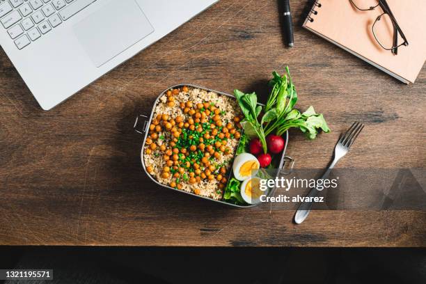 healthy lunch box office desk - lunch top view stock pictures, royalty-free photos & images