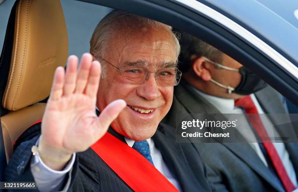 Outgoing Secretary-General of the Organisation for Economic Co-operation and Development Angel Gurria waves as he leaves after a ceremony to receive...