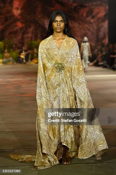 Model walks the runway during the First Nations Fashion + Design show during Afterpay Australian Fashion Week 2021 Resort '22 Collections at...