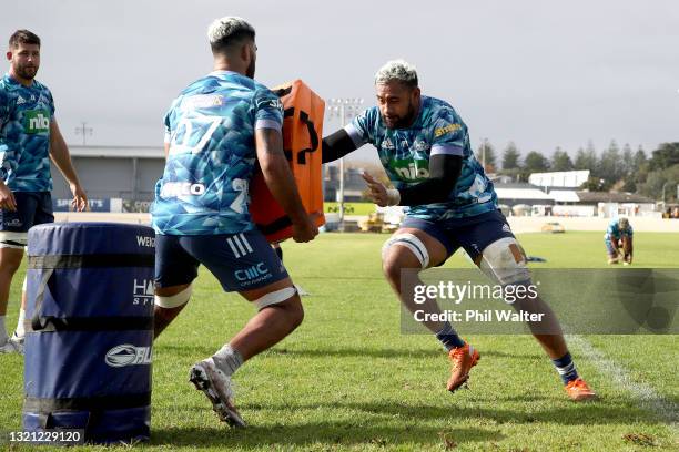 Patrick Tuipulotu of the Blues hits the tackle bag during a Blues Super Rugby Trans-Tasman training session at Blues HQ on June 02, 2021 in Auckland,...